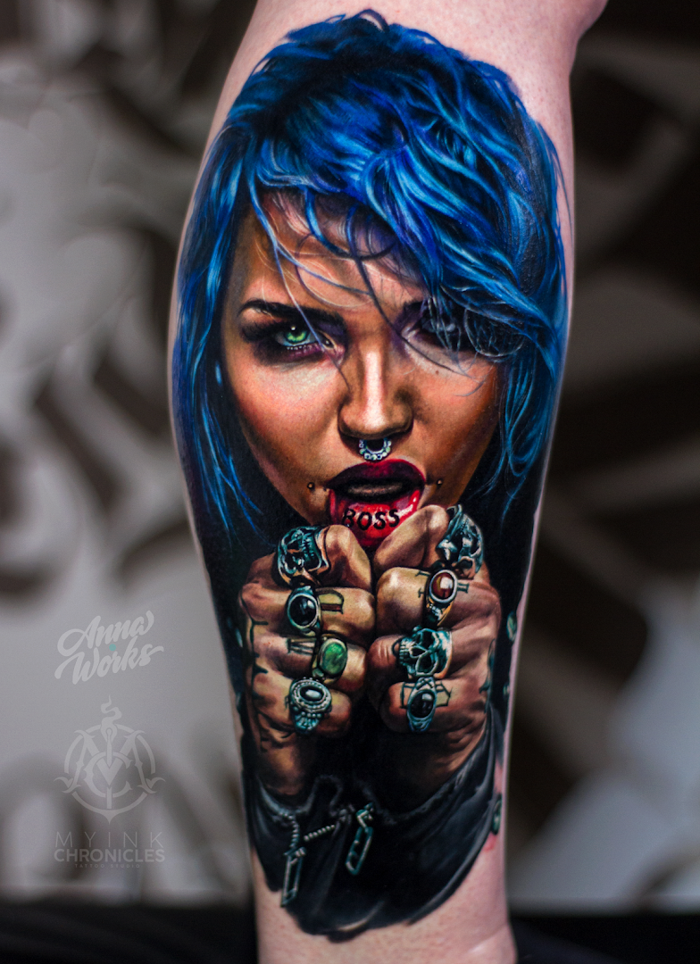 a cover-up tattoo of a woman with blue hair and a gun, siegen-wittgenstein, germany