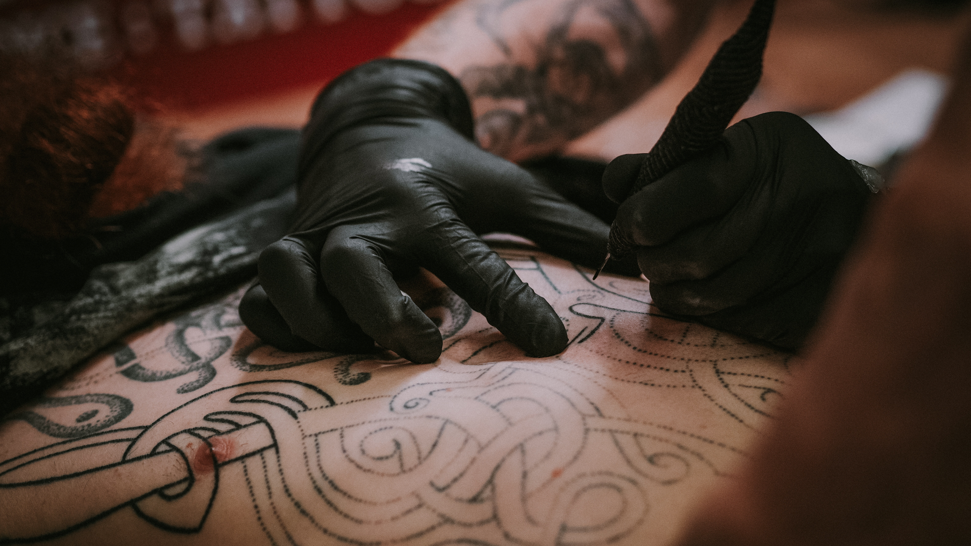 a japanische tattoos in leipzig artist is working on a tattoo, göppingen, germany