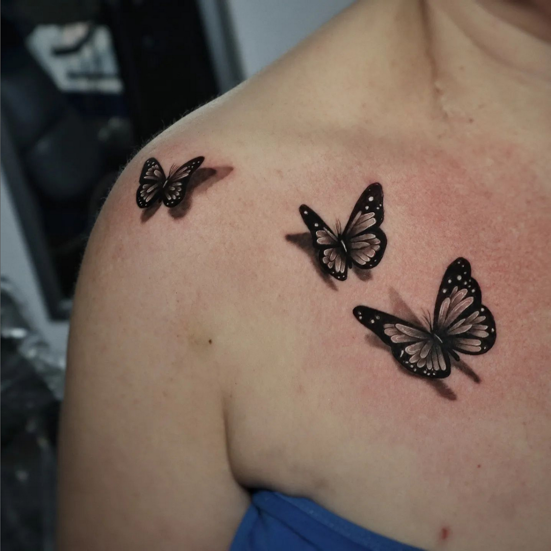 a woman with a cover-up tattoo on her shoulder, kassel, germany