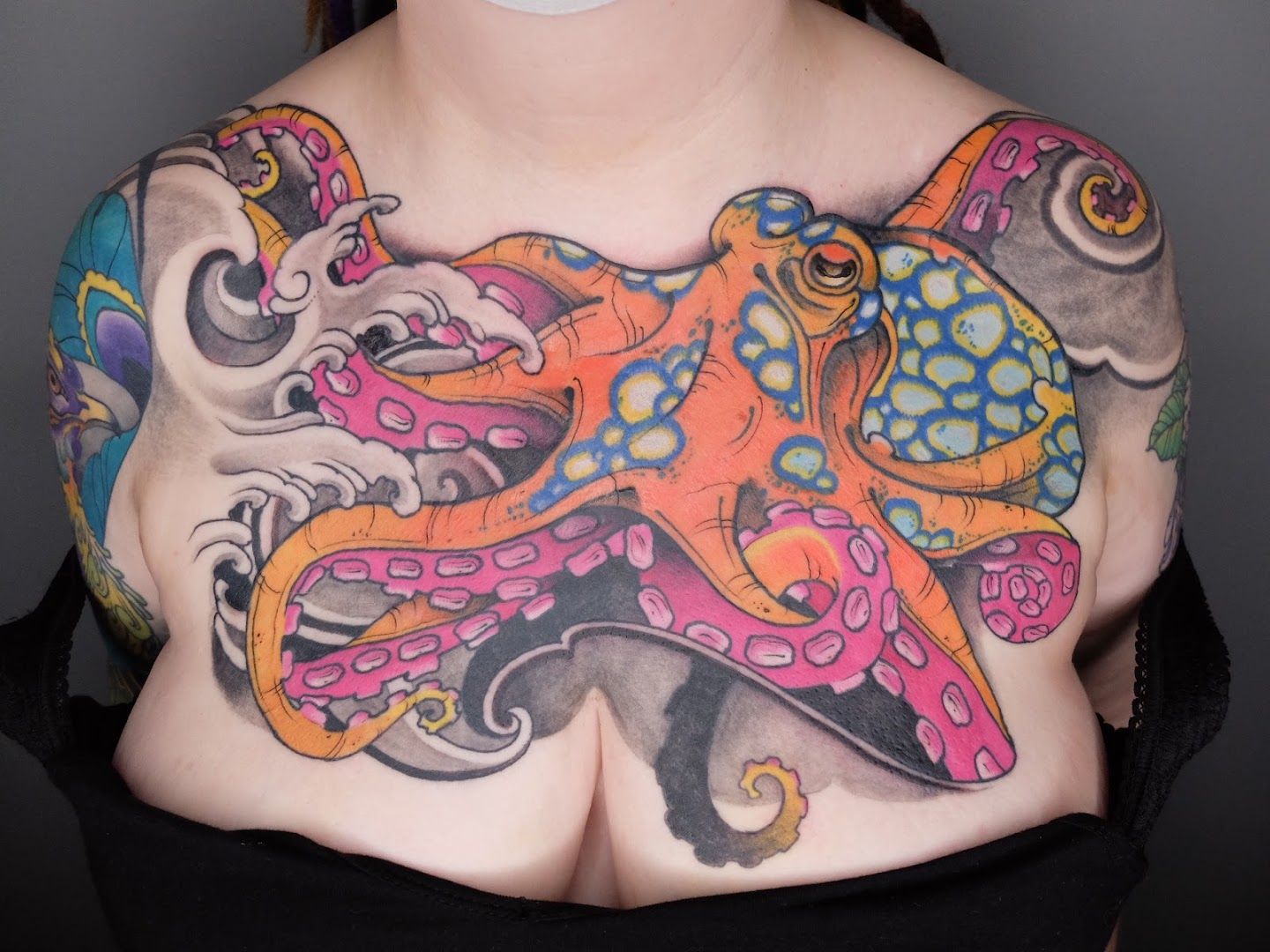 a woman with a japanische tattoos in leipzig on her chest, germersheim, germany