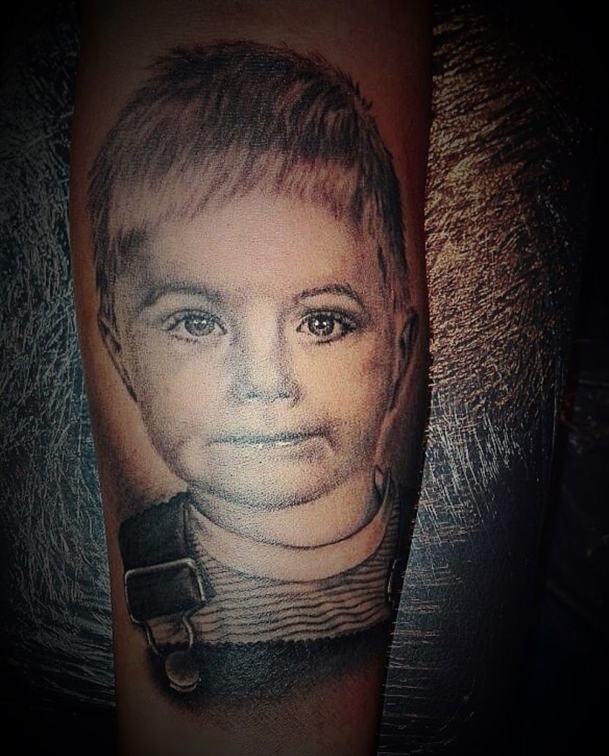 a narben tattoo of a boy with a black and white photo, vorpommern-greifswald, germany