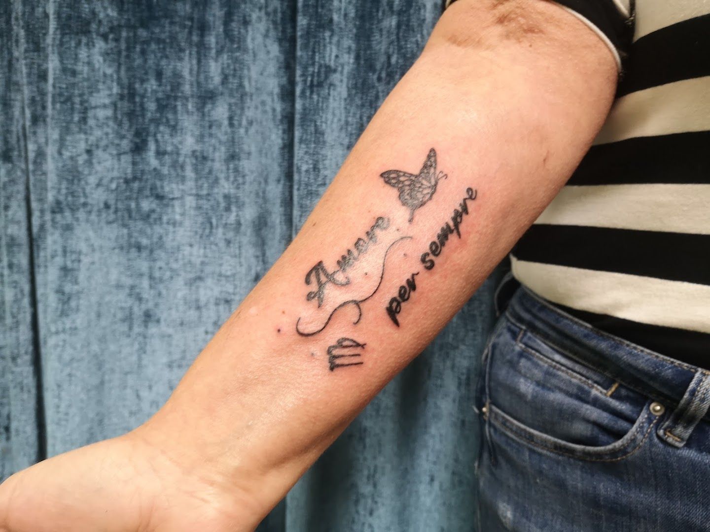 a narben tattoo of a unicorn with the words'unicorn'and a star, ansbach, germany