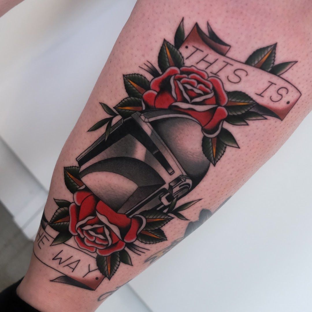 a cover-up tattoo with roses and a coffin, berlin, germany