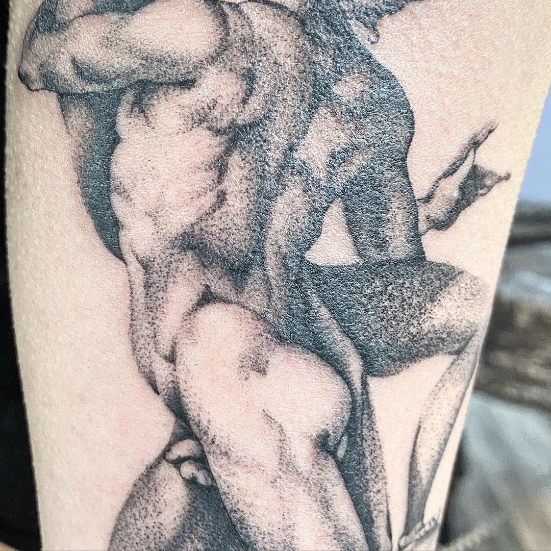 a narben tattoo of a nude woman with a man on her back, duisburg, germany