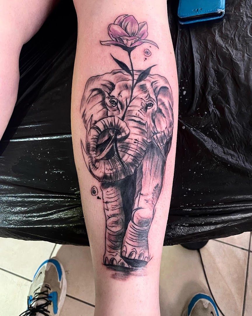 an elephant cover-up tattoo on the leg, bernkastel-wittlich, germany