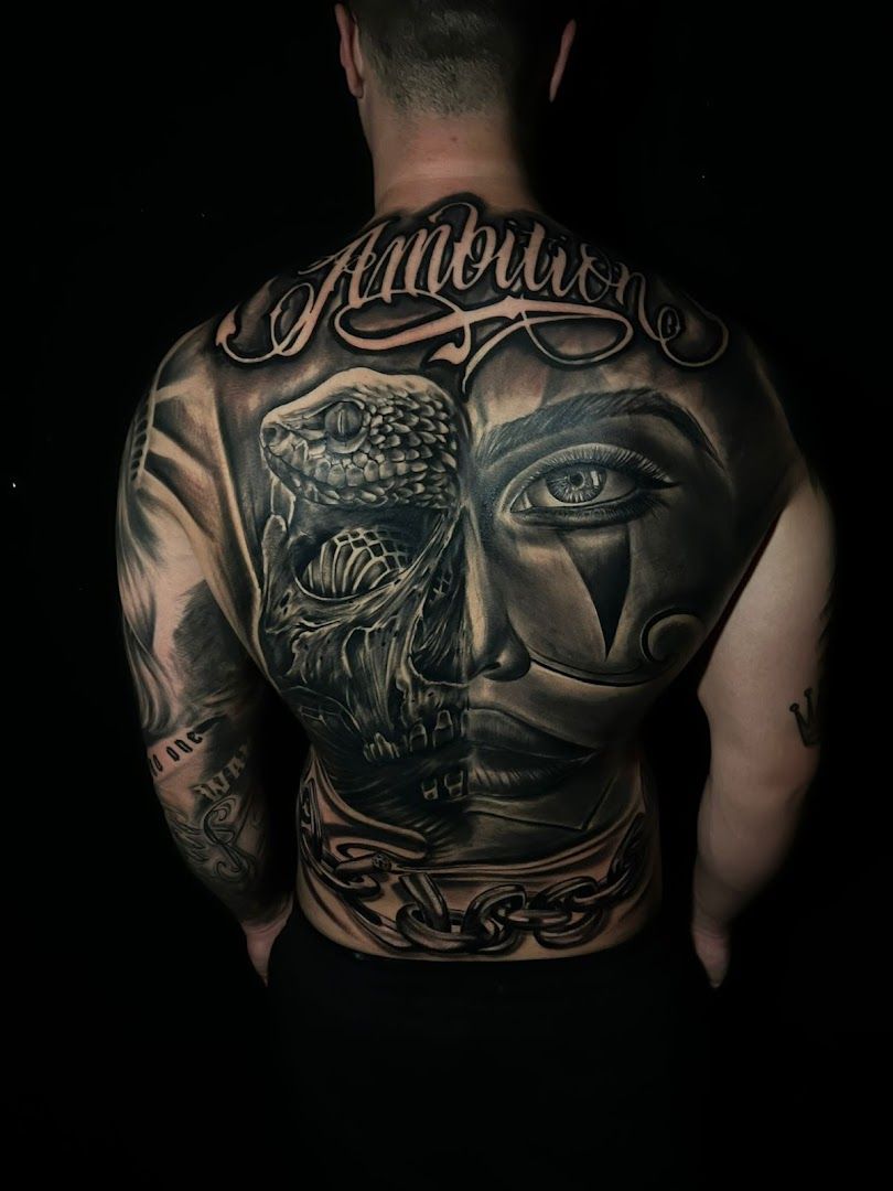 a man with a cover-up tattoo on his back, rhein-erft district, germany