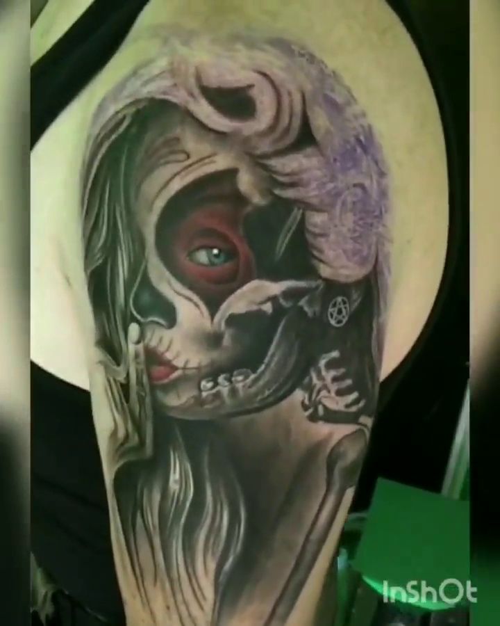 a cover-up tattoo of a woman with a skull on her shoulder, frankfurt, germany