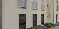 a row of houses with windows and shutters