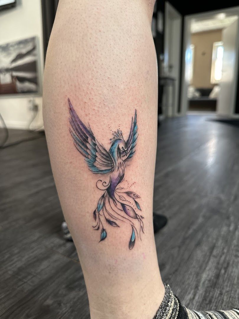 a narben tattoo of a bird with a blue wing, südwestpfalz, germany