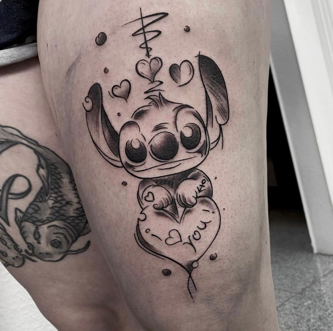 a cover-up tattoo of a dog and a heart, rhein-erft district, germany