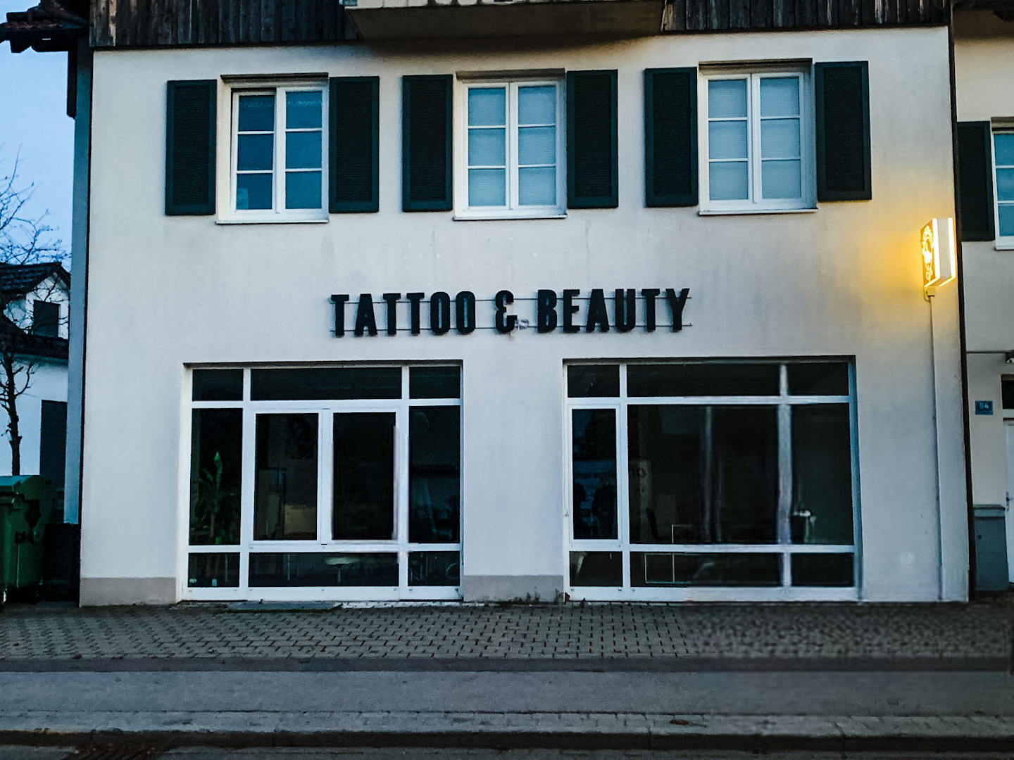 a building with a sign that reads tao city