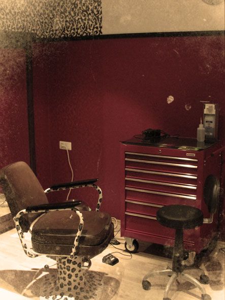 a room with a chair and a desk