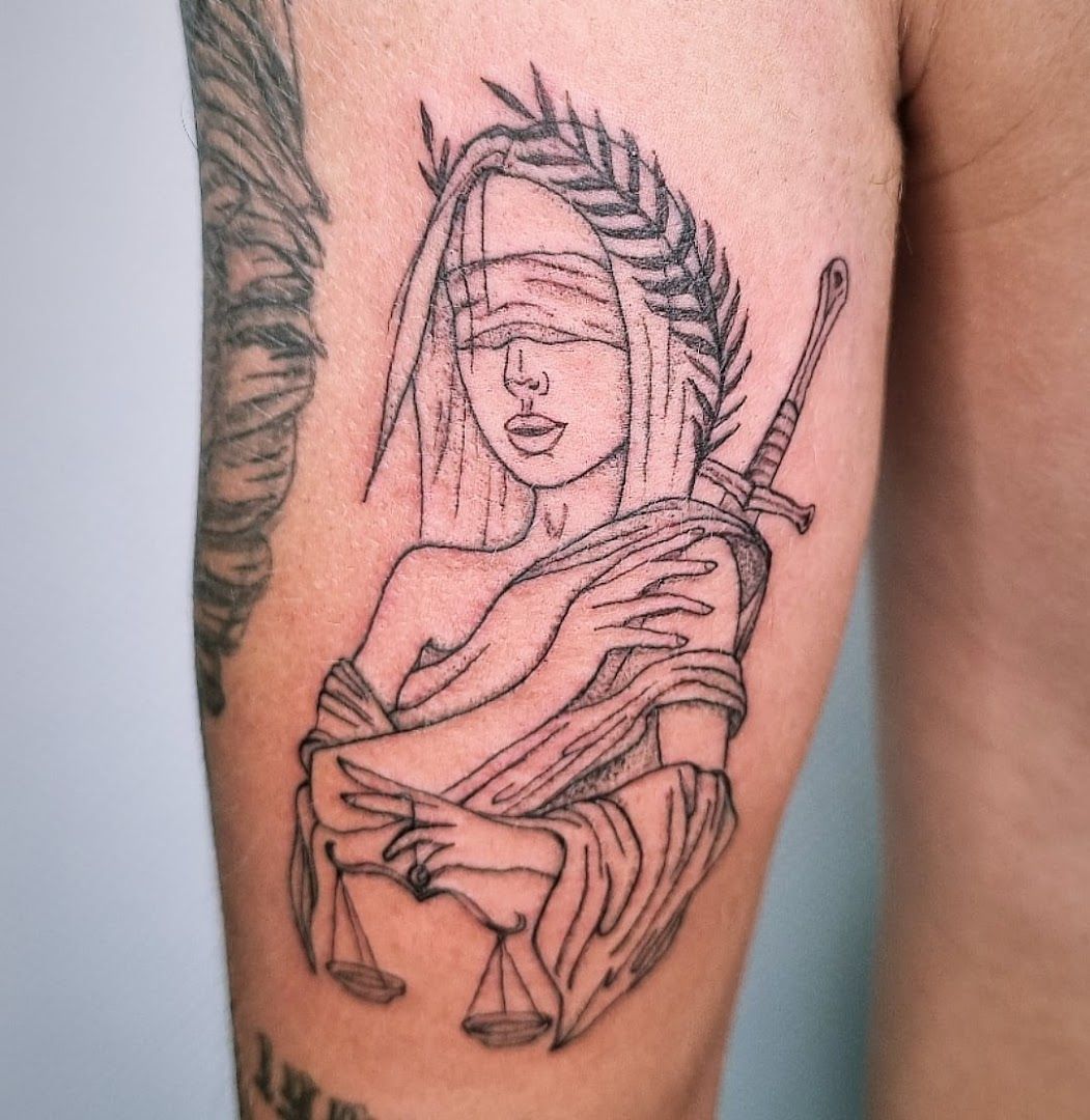 a narben tattoo of a woman holding a baby, märkischer kreis, germany