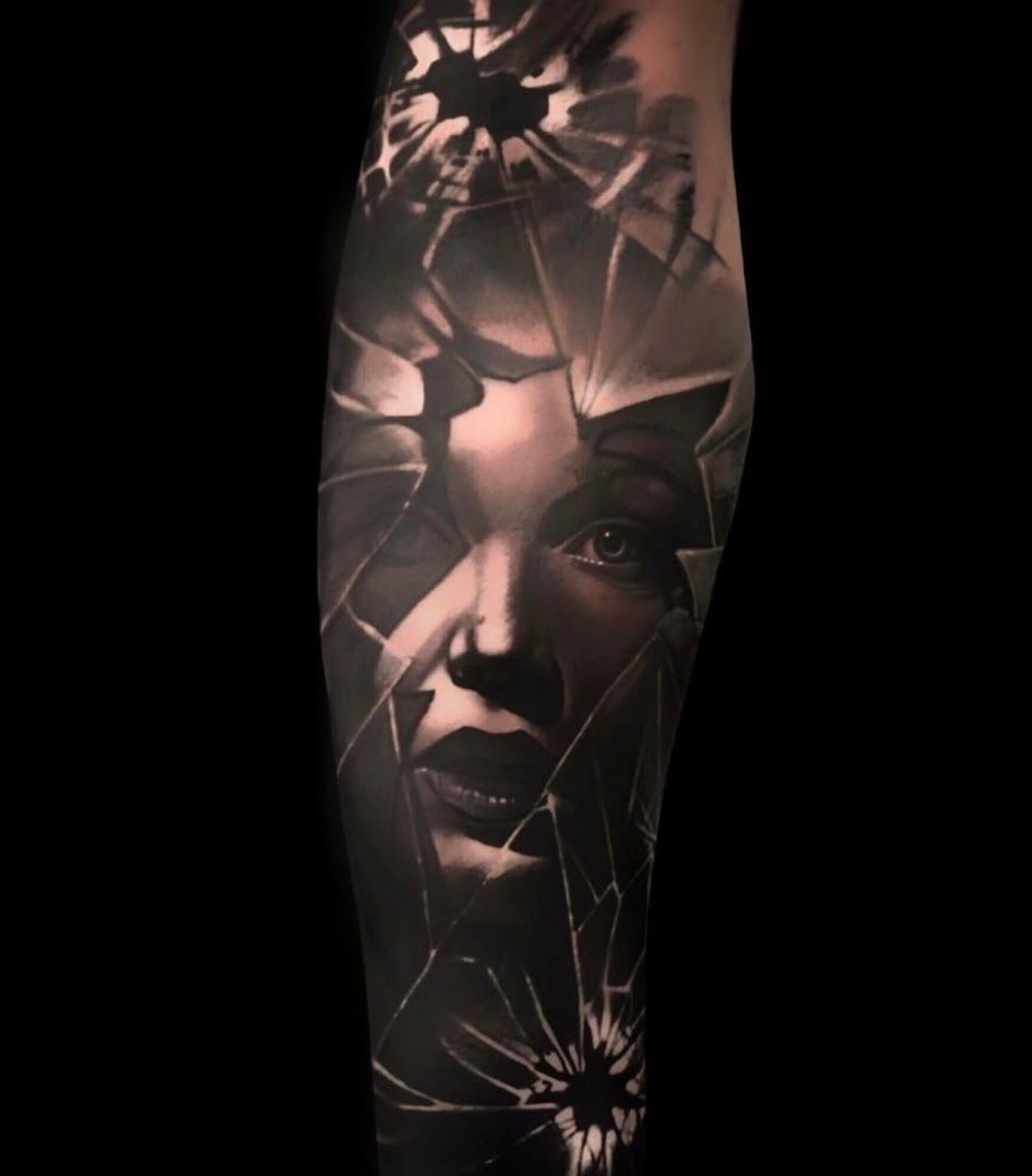 a black and white portrait tattoos of a woman's face, birkenfeld, germany