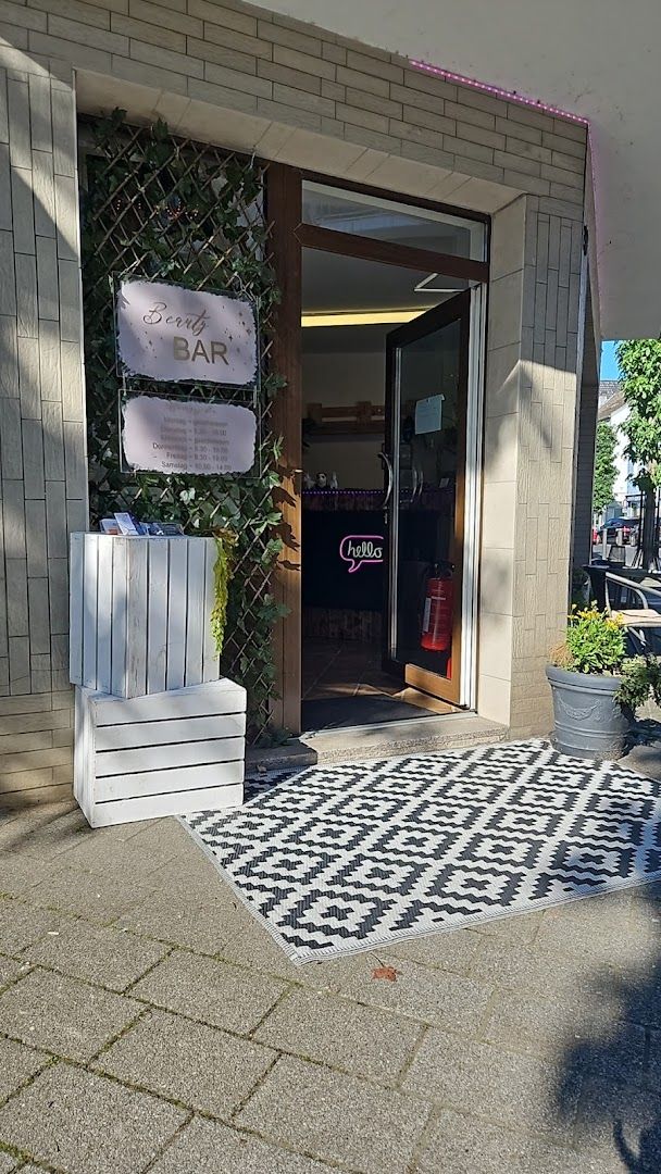 a building with a sign that says,'the entrance to the restaurant is open '