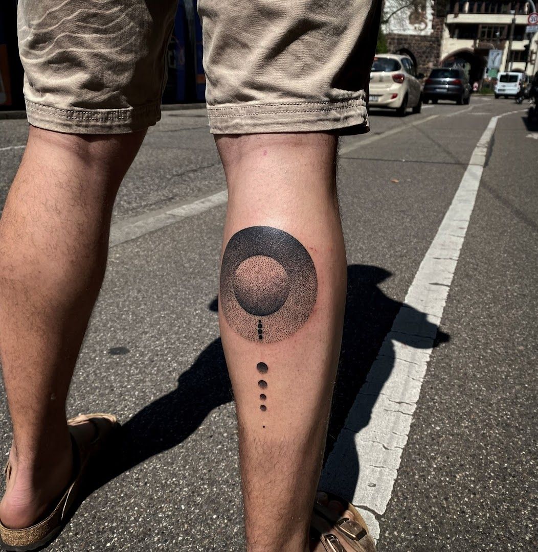 a man's leg with a black and white dot narben tattoo on it, kreisfreie stadt freiburg im breisgau, germany