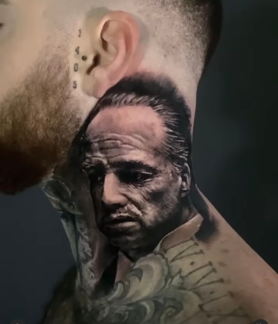 a man with portrait tattooss on his face and neck, bielefeld, germany