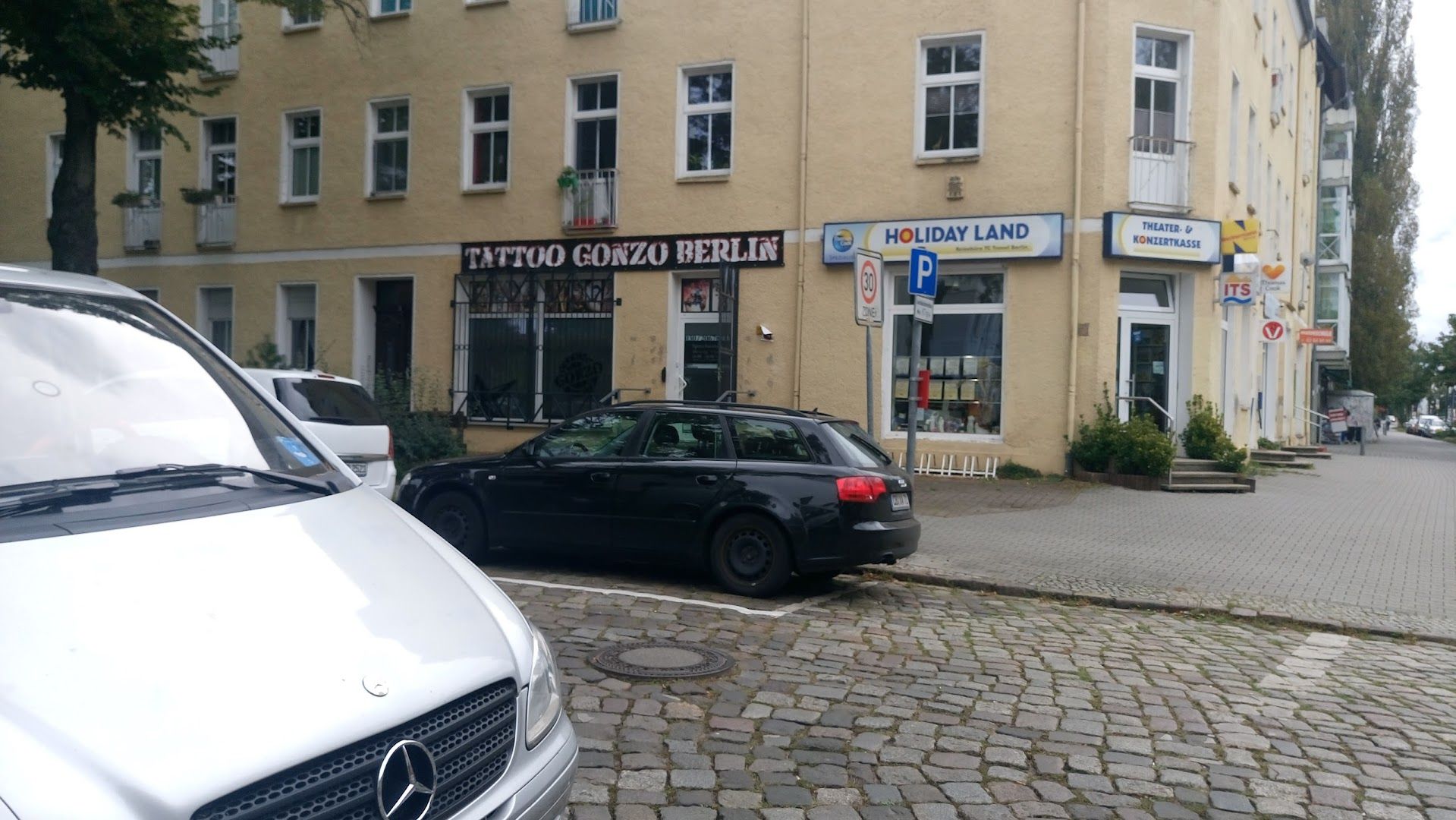 a car parked in front of a building