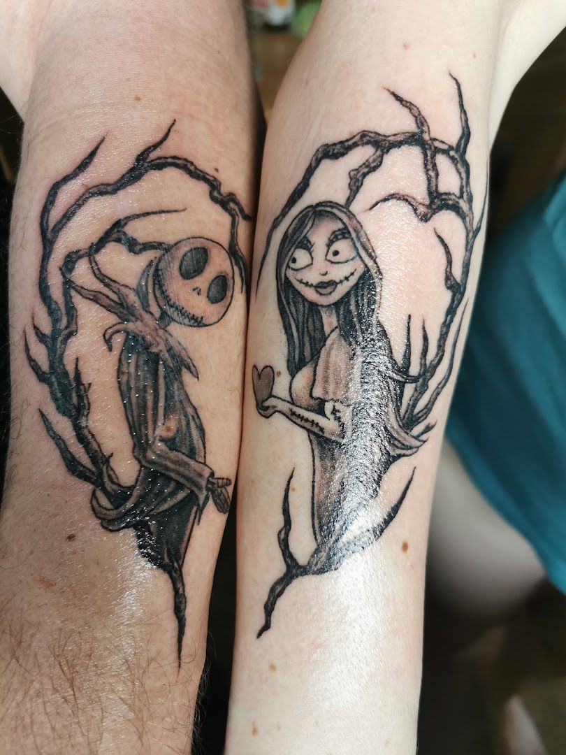 two blackwork tattoos of a couple holding hands, bad kreuznach, germany