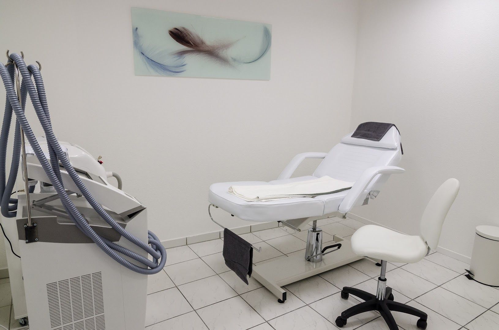 a dental room with a chair and a chair