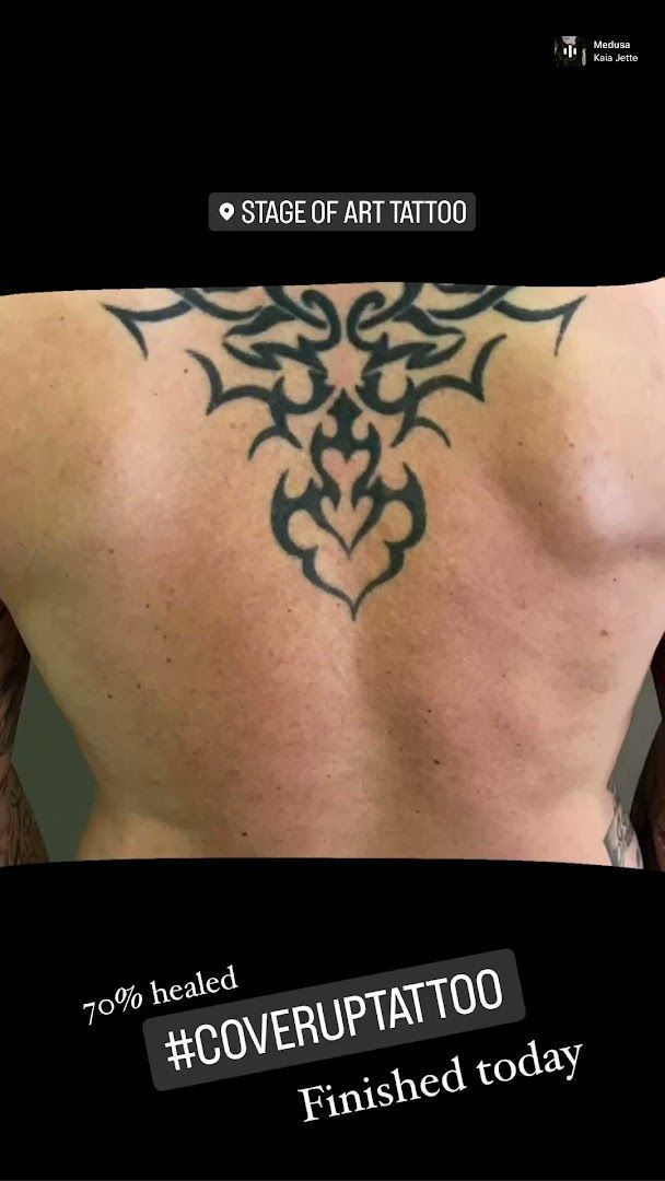 a man with a cover-up tattoo on his back, bielefeld, germany