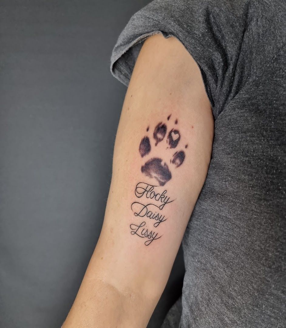 a woman with a trashpolka tattoos on her arm that says,'baby lady ', bayreuth, germany