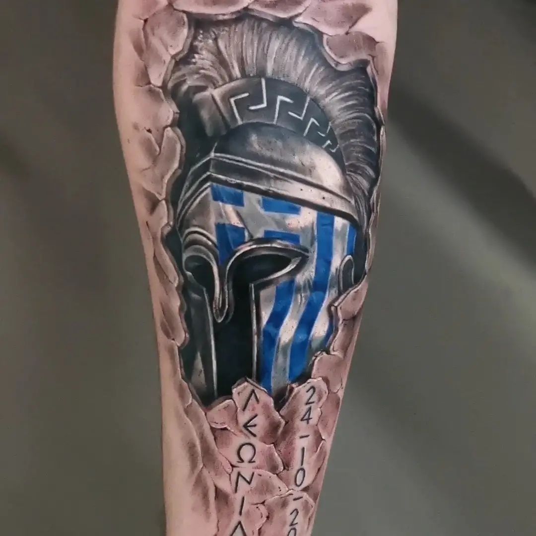 a cover-up tattoo of a spartan helmet with a blue and white stripe, esslingen, germany