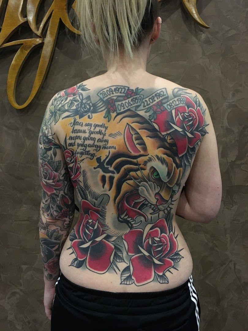 a woman with a cover-up tattoo on her back, kreisfreie stadt bottrop, germany