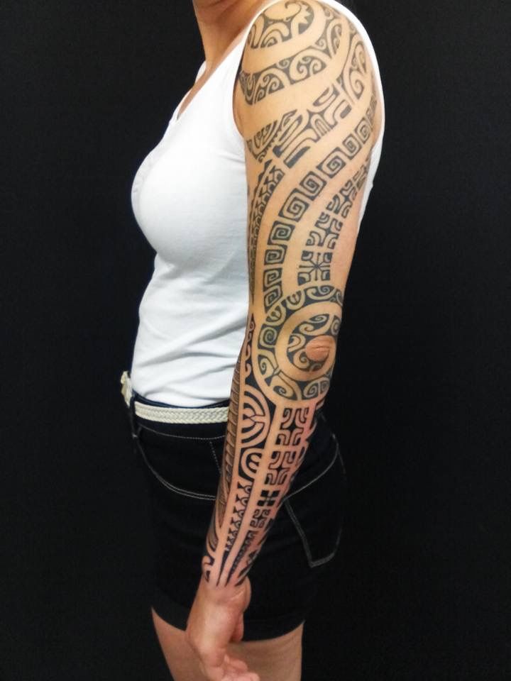 a woman with a japanische tattoos in leipzig on her arm, oberhavel, germany