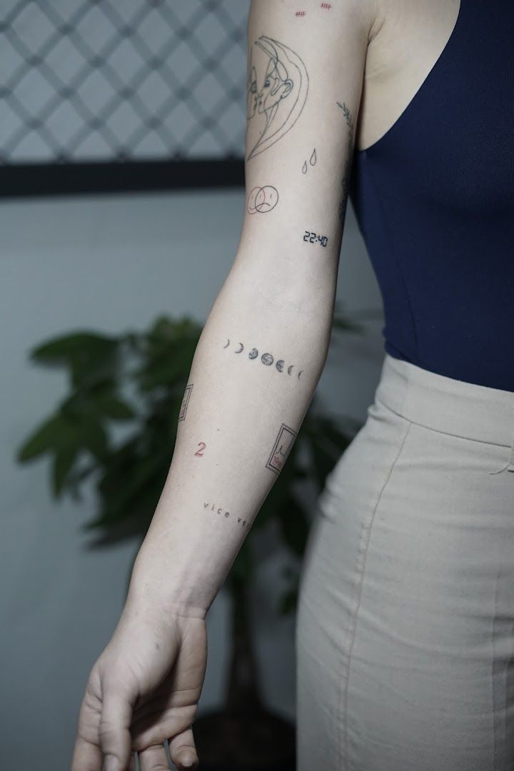 a woman with a cover-up tattoo on her arm, hamburg, germany