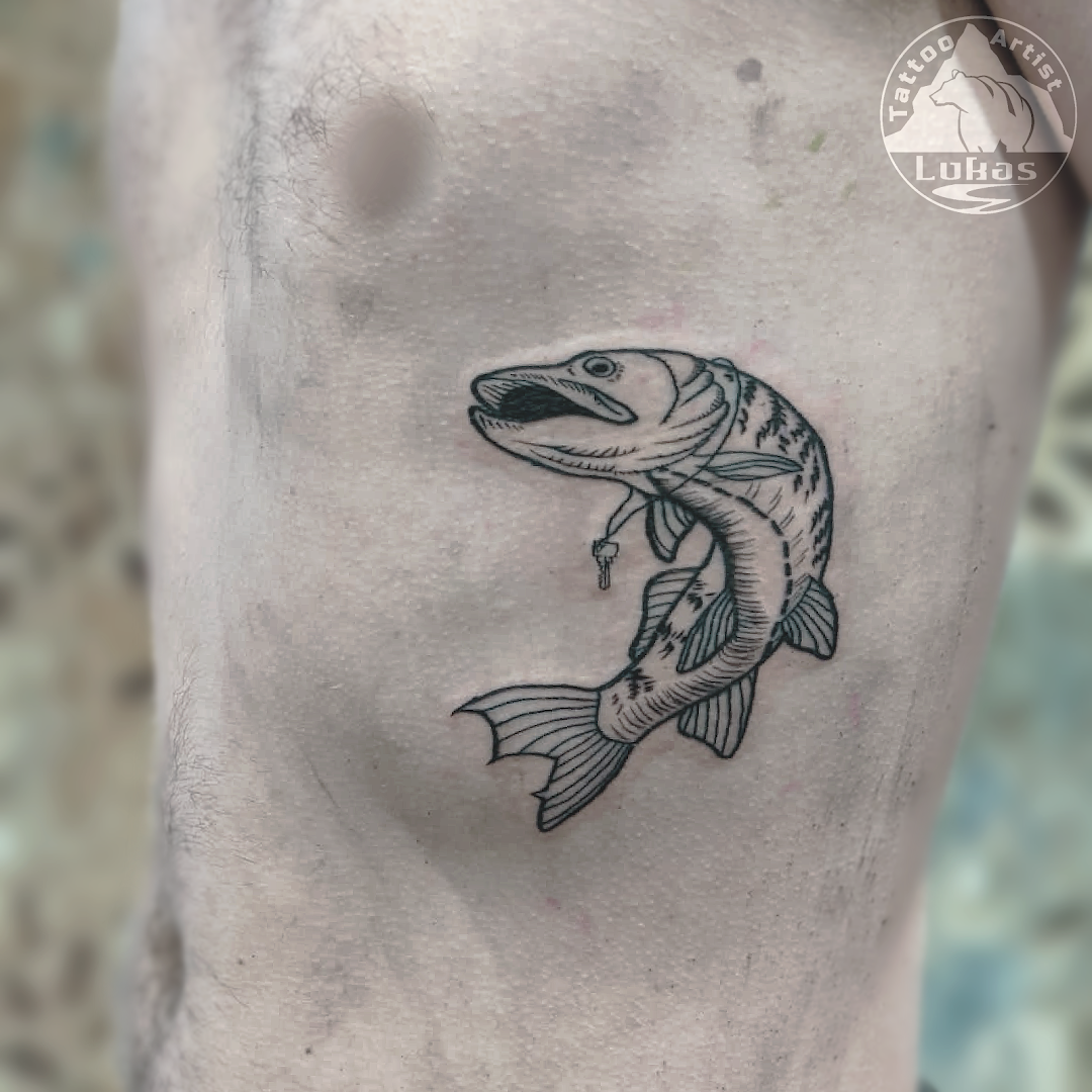 a cover-up tattoo of a fish on the leg, dresden, germany