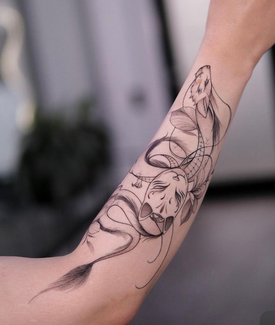 a woman's arm with a narben tattoo of a woman's face, kassel, germany