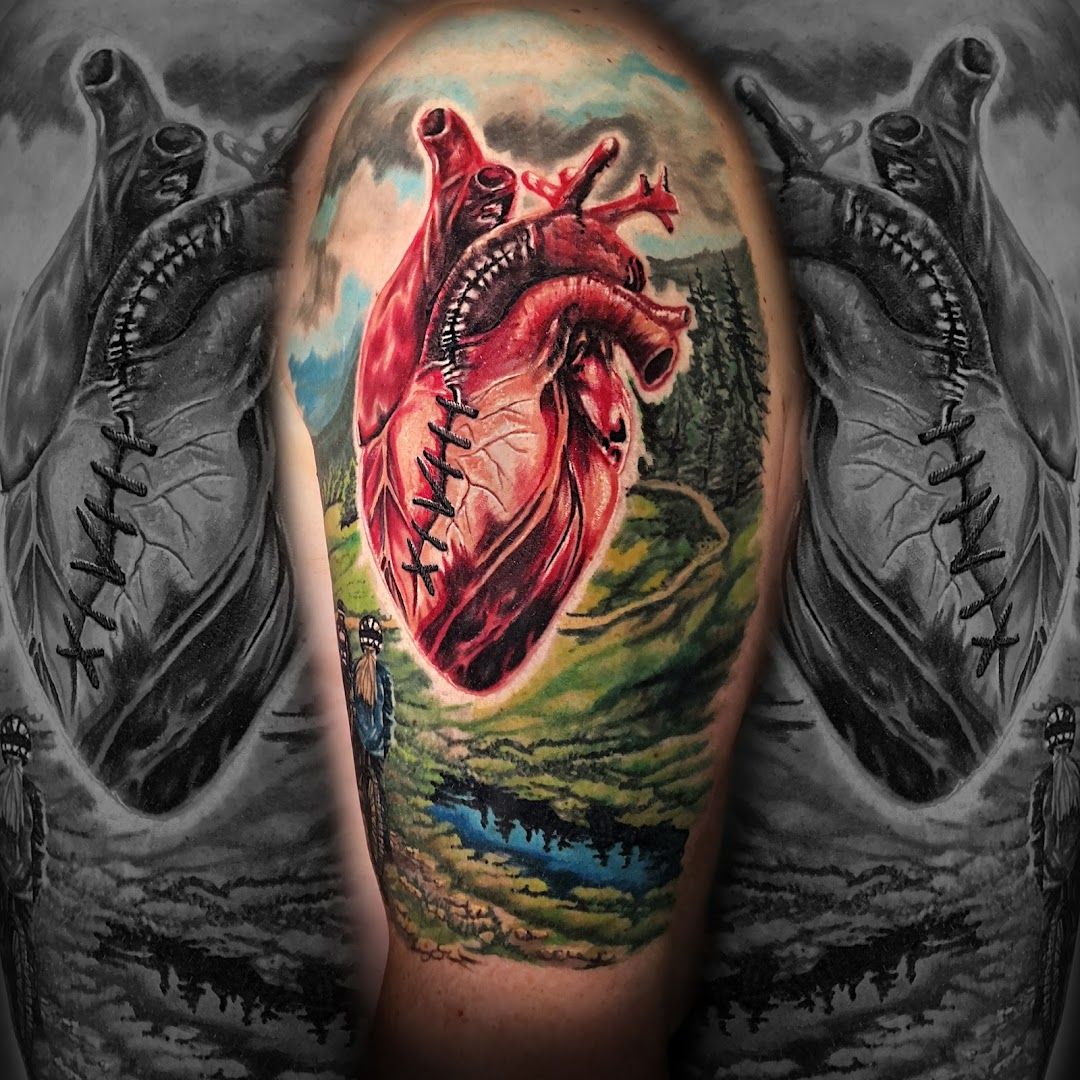 a japanische tattoos in leipzig of a heart with a dragon on it, bitburg-prüm, germany