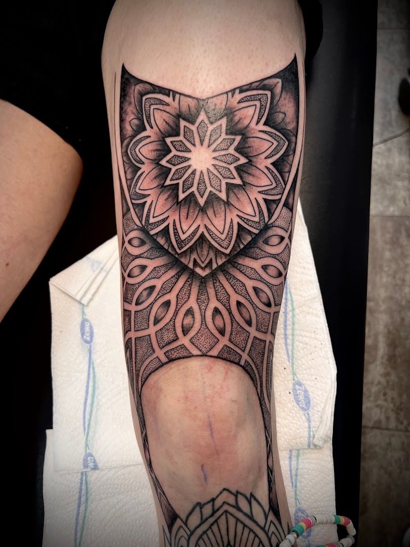 a black and white cover-up tattoo of a flower, kaiserslautern, germany