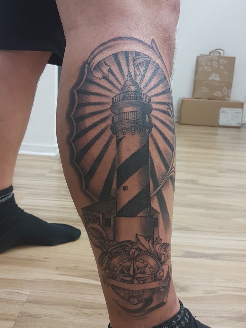 a lighthouse narben tattoo on the leg, rheinisch-bergischer kreis, germany
