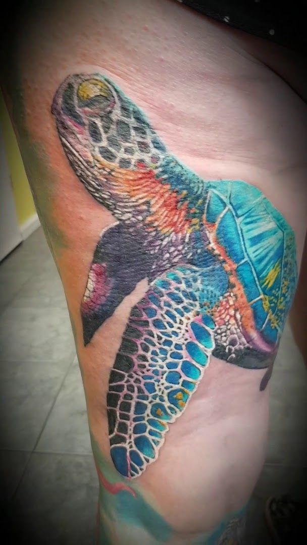 a cover-up tattoo of a turtle on the leg, frankfurt, germany