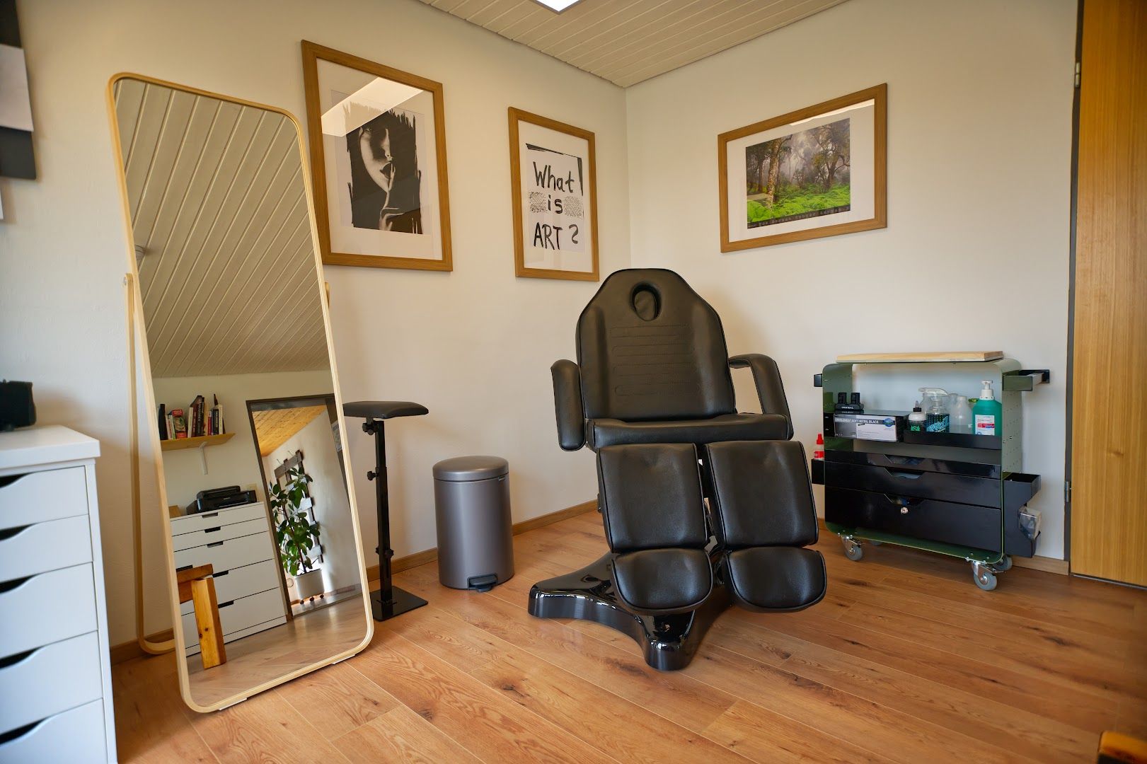 a chair in a room with a mirror and a chair