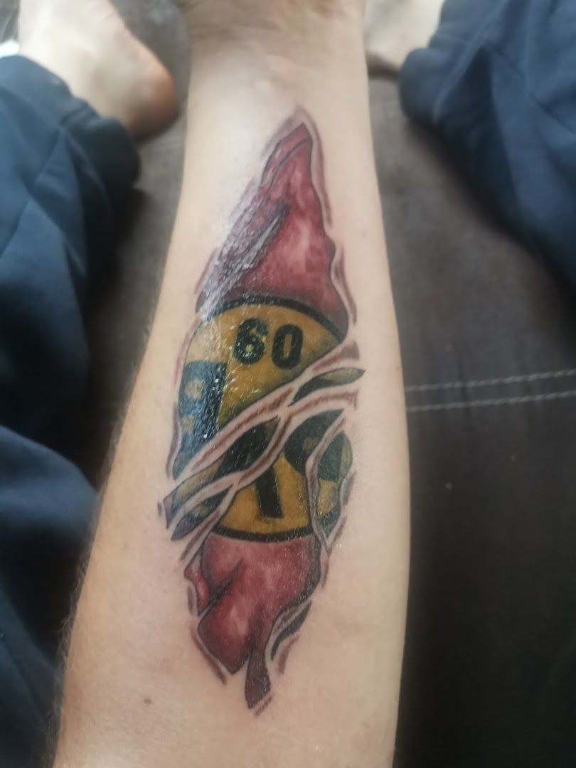 a narben tattoo with a bird on it, mettmann, germany