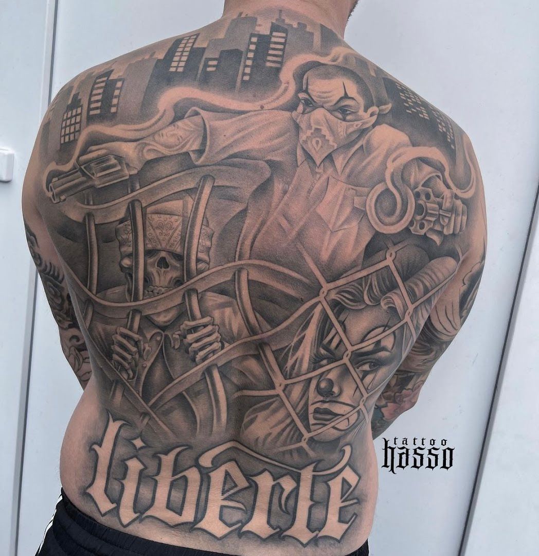 a man with a full back cover-up tattoo, berlin, germany