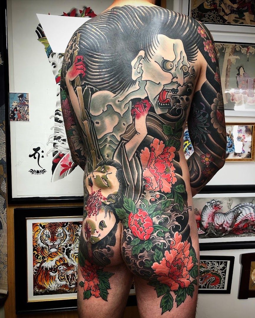 a man with a japanische tattoos in leipzig on his back, forchheim, germany