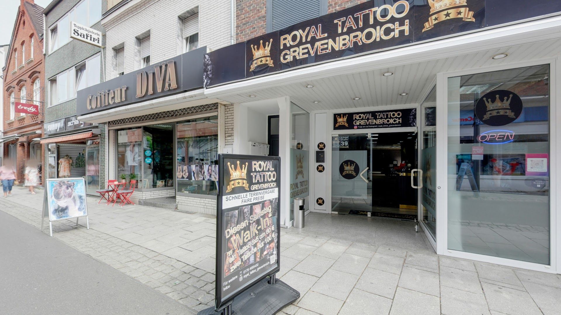 a store front with a sign on the front