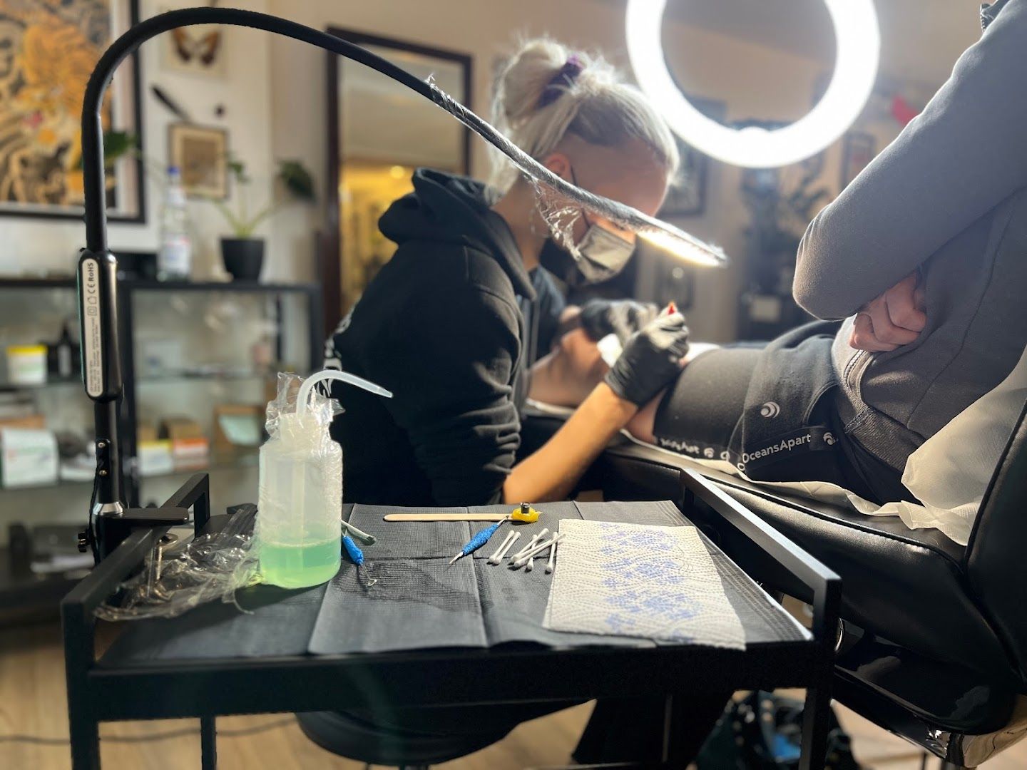 a woman in a salon getting her hair done