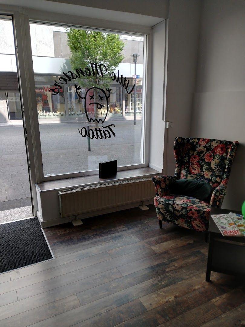 a chair and a window with the words'welcome to you '