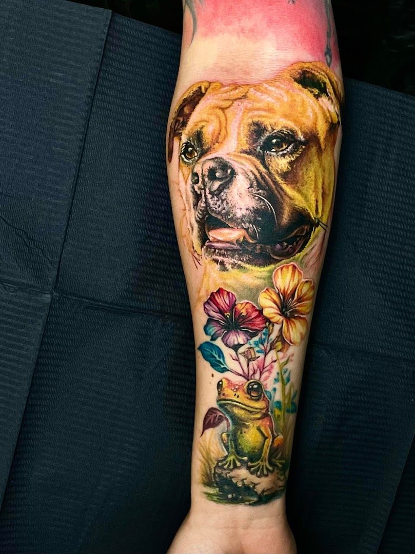 a boxer dog cover-up tattoo on the forearm, kreisfreie stadt augsburg, germany
