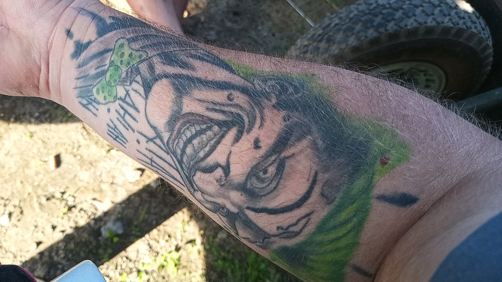 a man with a cover-up tattoo on his arm, dahme-spreewald, germany