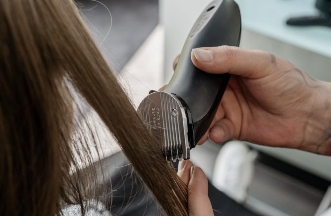 a woman getting her hair done at a salon