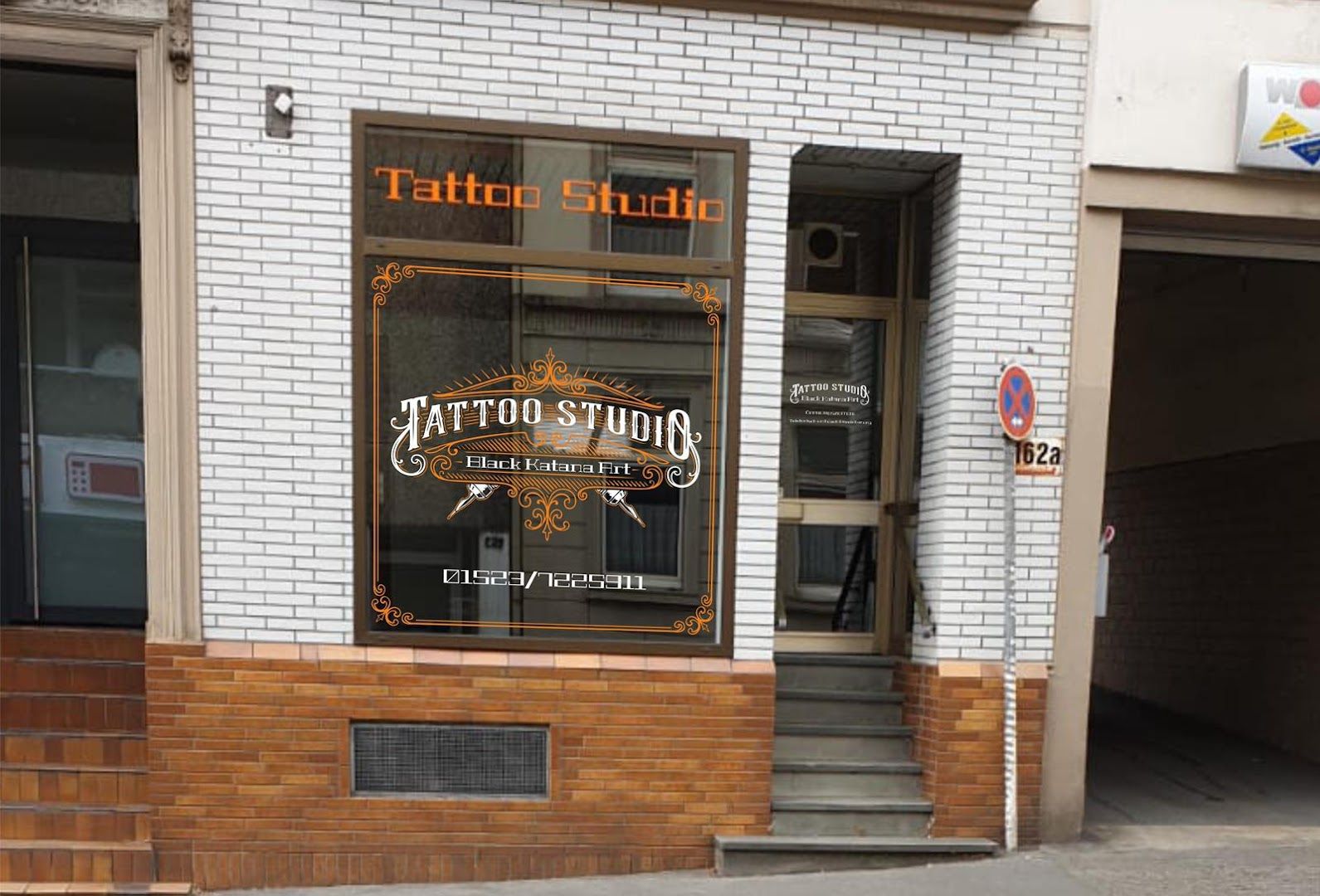 a brick building with a sign that says tato's