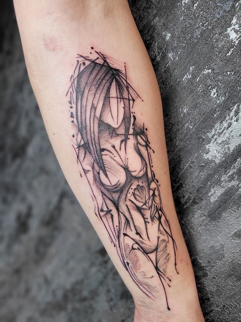 a narben tattoo of a woman's face with a geometric pattern, kreisfreie stadt braunschweig, germany