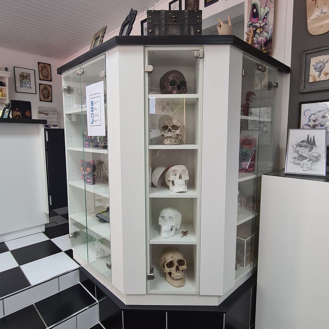 a display case with a skull inside of it