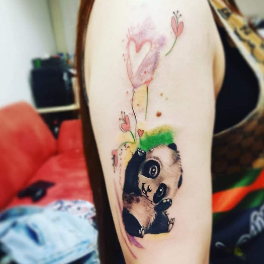 a cover-up tattoo with a panda and flowers on it, kreisfreie stadt heilbronn, germany